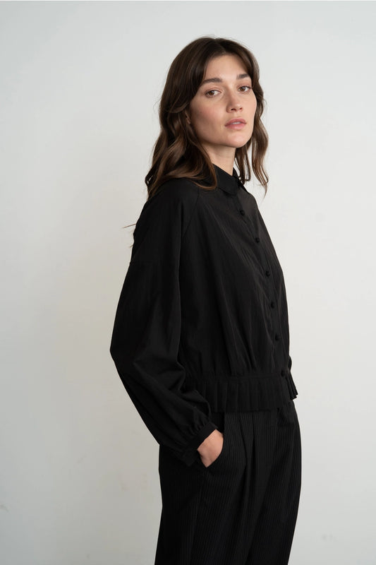 PLEATED HEM RAGLAN SHIRT